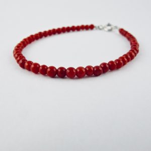 Bracelet de petites perles rondes de 3 mm de véritable corail rouge de Méditerranée, monté avec fermoir argent 925/1000e.